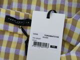 a close up of a shirt with a tag on it