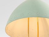 a light green pendant lamp hanging from a white ceiling