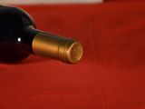 a bottle of wine that is sitting on a table