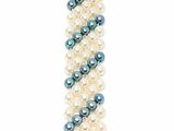 a close up of a white and blue bracelet on a white background