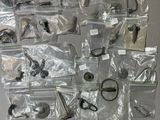 many different types of scissors in bags on the table