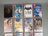 a lot of nintendo wii games on the table