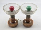 two wine glasses that are sitting on top of each other