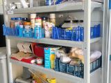 many shelves of food and drinks in the kitchen