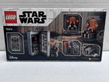 a box of lego star wars action figures on a white surface