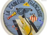 a clock with a picture of a plane on it