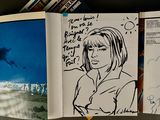 a book with a drawing of a woman on it