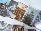 many old postcards that are on the table
