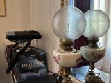 a lamp that is sitting on a table in front of a mirror