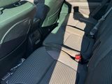 the back seats of a car with a seat belt in a car
