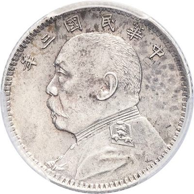 a close up of a silver coin with a man ' s face