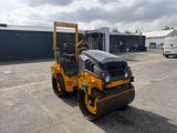 a picture of a yellow and black road roller