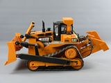 a toy bulldozer that is sitting on a table