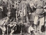 several black and white photos of a group of people posing for a picture