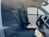 a seat in the back of a van with the sun shining on it