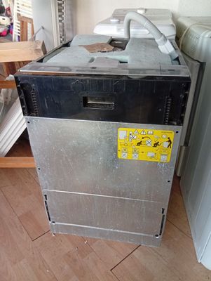 an image of a dishwasher sitting in a room