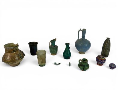 many different types of vases on a white surface