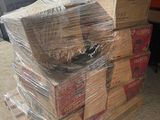 a stack of boxes sitting on a pallet in a warehouse