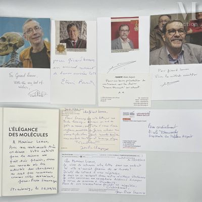 many letters and pictures on the wall of a room