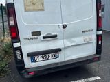 a white van that is parked in a parking lot
