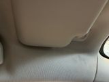 a car seat with a remote control in the back of it
