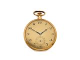 une vieille montre de poche en or avec des chiffres romains sur le cadran