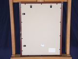 a picture of an easel with a painting on it