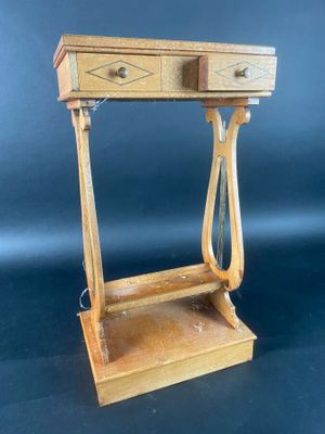 an image of a small wooden table with two drawers on it