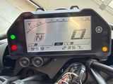 a close up of a motorcycle with a display on it