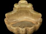 a marble bowl with a water fountain inside of it
