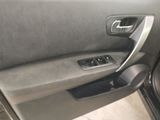 the interior of a car with the door open and the door handle open