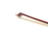 wooden chopsticks on a white surface with a white background
