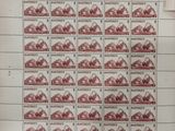 an image of a sheet of stamps with a mountain scene on them
