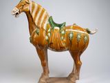 statue of a horse with a saddle on it ' s back