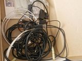 a box with a bunch of wires and cords in it