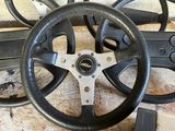 a steering wheel that is sitting on a table