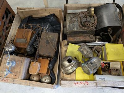 a box full of assorted items sitting on the floor