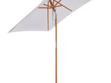 a white umbrella with a wooden pole on a white background