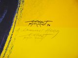 graffiti on a yellow wall with a black and blue stripe