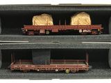 deux boîtes contenant chacune un wagon