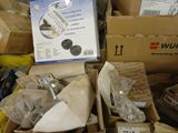 many boxes of assorted items sitting on the floor