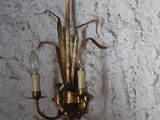a picture of a wall mounted light fixture in a living room