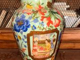 a vase that is sitting on a shelf in a room