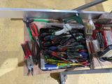 a box full of tools sitting on a table