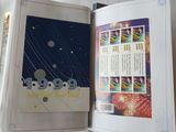 an open book with a picture of fireworks in the sky