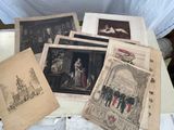a lot of old pictures on the table