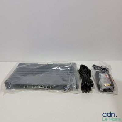 an image of a box with two cables and a remote control in it