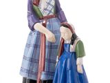 une image représentant une figurine d'une femme et d'un enfant