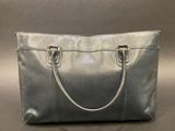 silver leather tote bag with gold hardware