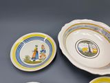 three plates with a picture of a man and a woman on them